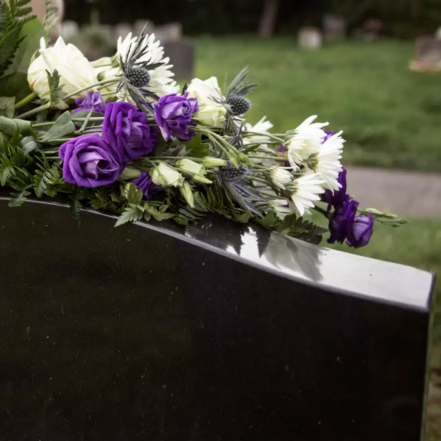 black granite headstone grave marker